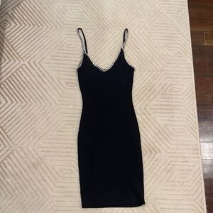 Elegant Black Dress with Rhinestone Straps
worn once
size s
